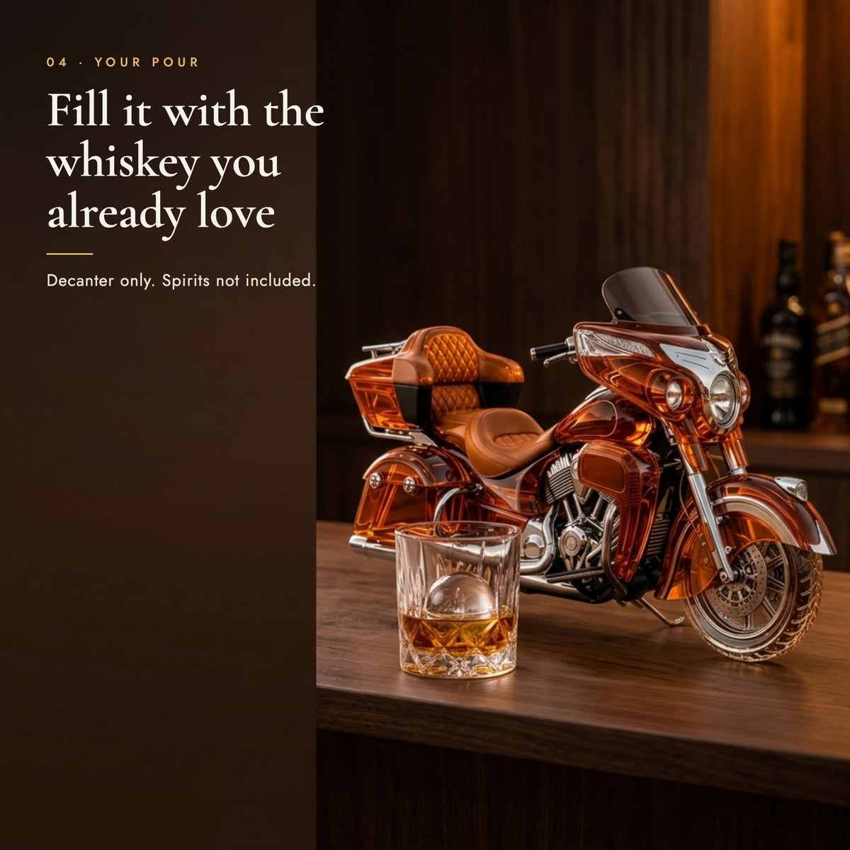Motorcycle decanter beside a rocks glass of whiskey; spirits not included