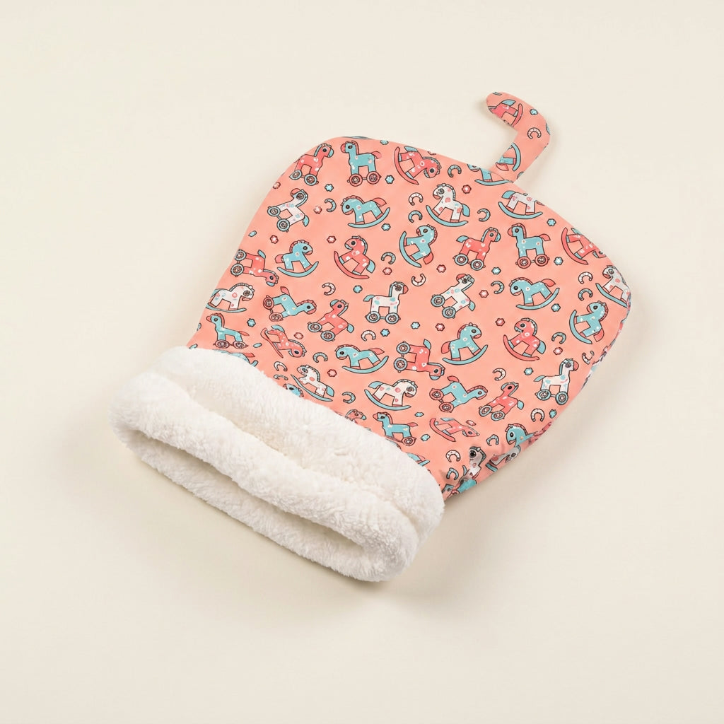 Snuggle Burrow pet sleeping bag in Coral Pony print
